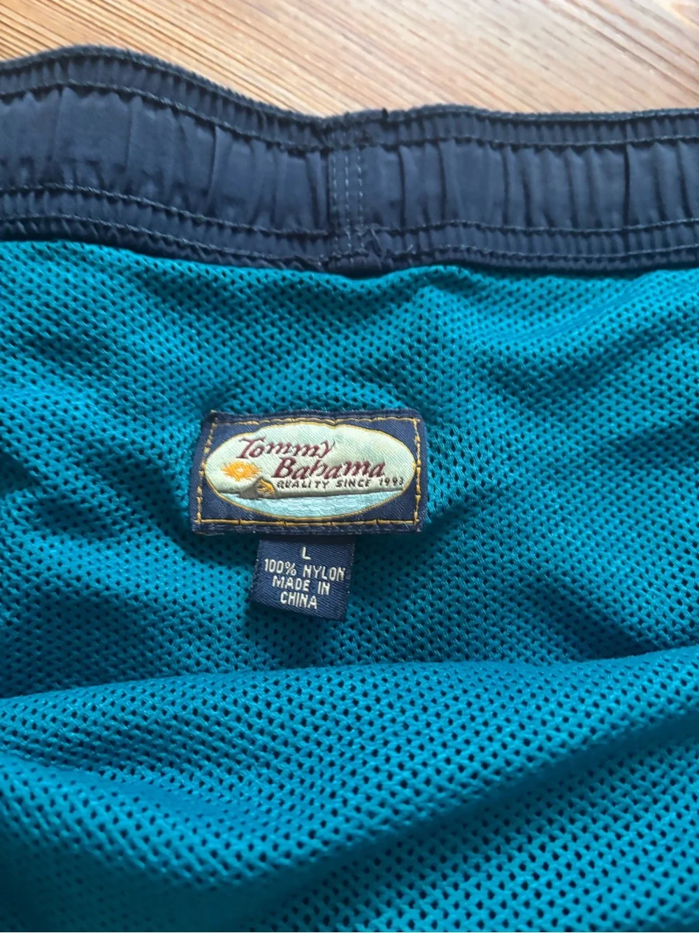 Tommy Bahama Teal Mesh Lined Swim Shorts with Navy Waistband